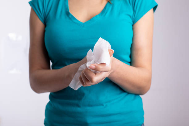 istock Prevention of infectious diseases - Cleaning hands with wet wipes 1286860876