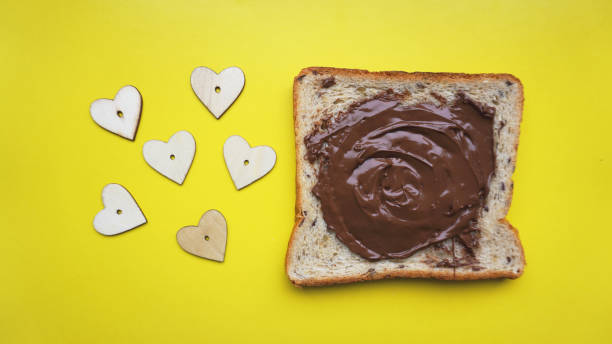 istock Toast on yellow background. View from above - Copy space photography 1286861585