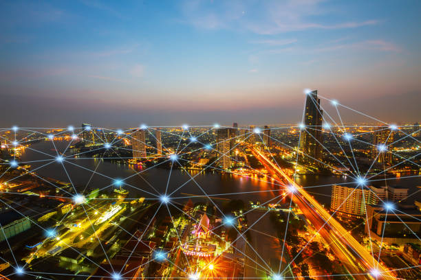 istock Smart city at night with network connections aerial view, communication technology concept 1286862288