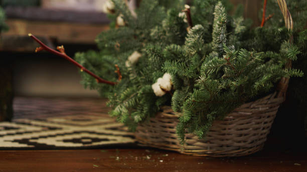 istock Christmas Card - basket with Christmas tree branches 1286864541