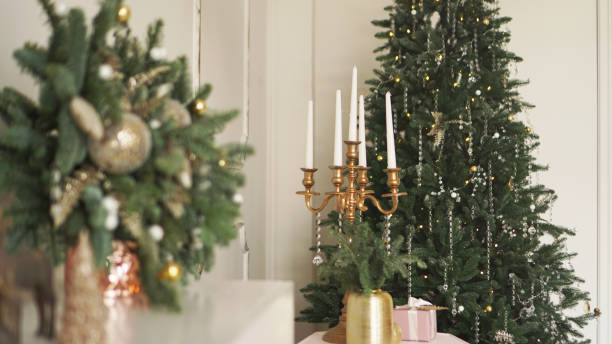 istock Christmas morning. Classic apartments with white interior, decorated tree 1286864646