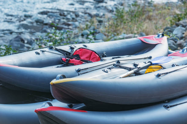 istock Inflatable boats on the mountain river shore. 1286867162