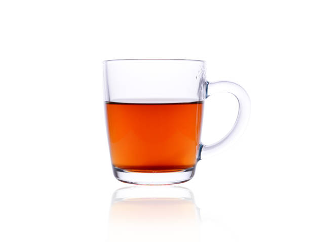 istock transparent mug with black tea on a white background. 1286868303