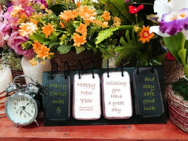 istock Text on desktop calendar, Merry Christmas and Happy New Year. 1286871382