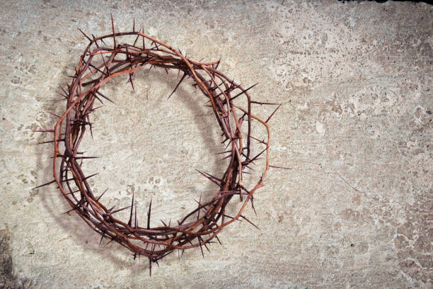 istock A crown of thorns on a stone texture background 1286871454