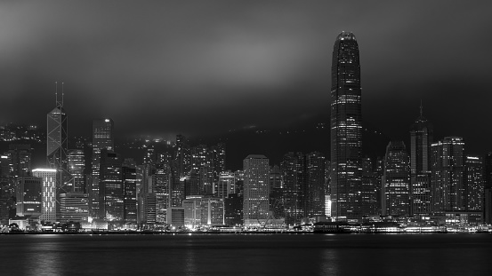 Hong Kong / China - July 26, 2015: Panoramic night view of Hong Kong skyline across Victoria Bay