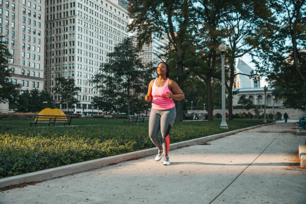 istock Woman getting healthy and fit training outdoors 1286873272