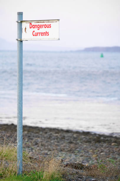 istock Dangerous currents at sea sign under bridge 1286873278