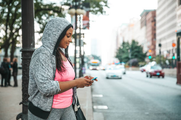 istock Woman walking home after work out at the park 1286873828