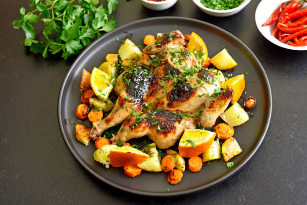 istock Spatchcocked grilled chicken with vegetables on plate 1286874850