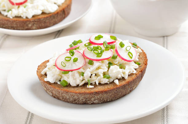 istock Bread with curd cheese, radish and green onion 1286877190