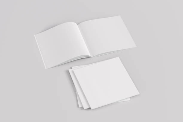 istock Stack of closed and open square magazine or brochure  mockup on white background 1286877234