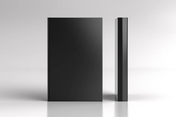 istock Two hardcover  vertical black mockup books standing on the white background. Blank front cover and spine of book. 1286878966