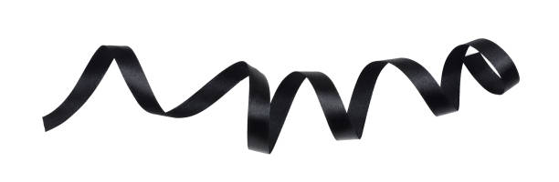 istock Black silk twisted ribbon isolated on white 1286880302