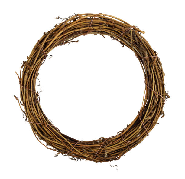 istock Dry brown empty rattan wreath isolated on white 1286880333