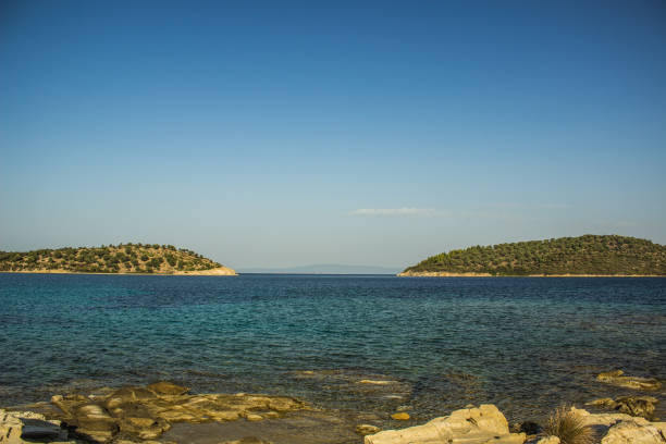 istock wilderness rustic nature scenic view Mediterranean sea shore line environment space without people here with two islands on horizon in summer clear weather day time 1286881256
