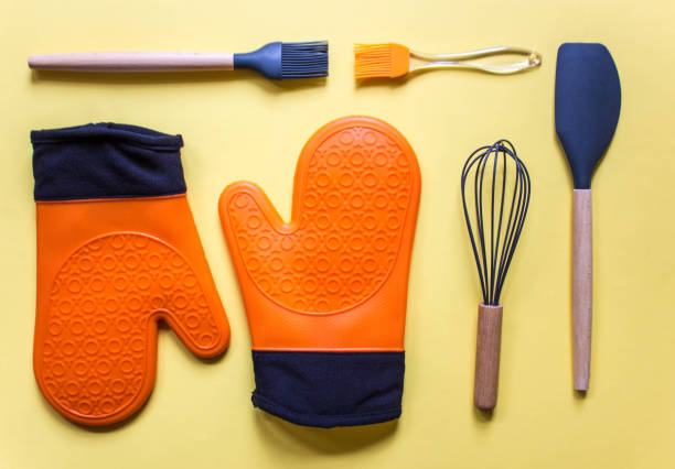 istock flat lay on yellow background kitchen cooking tools and accessories. Concept of home design. Free copy space. 1286882716