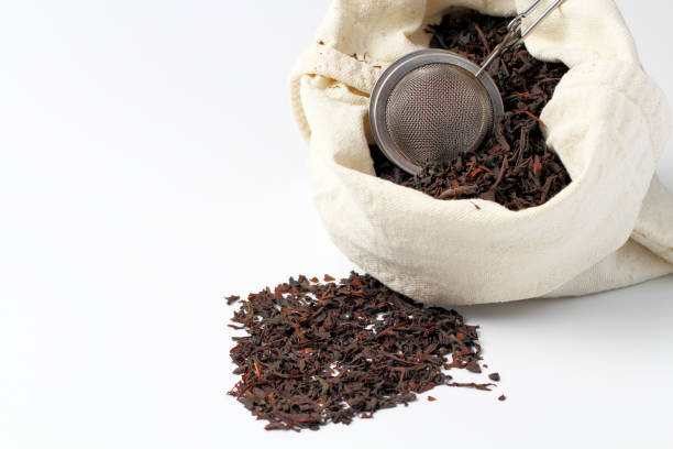 istock Tea strainer with tea leaves on a white background close-up,isolate. 1286882760
