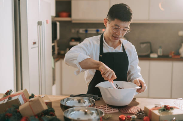 istock asian chinese dessert chef cook preparing and stirring chocolate ingredient preparation for shortbread christmas celebration 1286886036