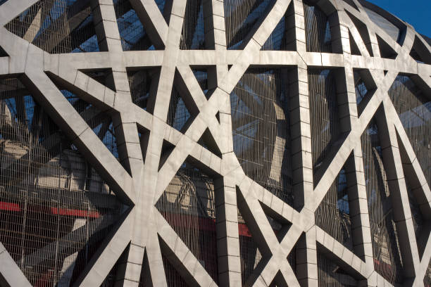 Details in the construction of the Beijing National Stadium Birds Nest Details in the construction of the Beijing National Stadium Birds Nest, home to the 2008 Beijing Summer Olympic games XXIX Olympiad beijing olympic stadium photos stock pictures, royalty-free photos & images