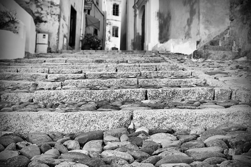 Alley, Calvi, old town, Corsica, France. Shallow depth of field.