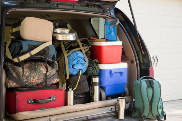 istock Packing vehicle for camping vacation trip. 1286889691