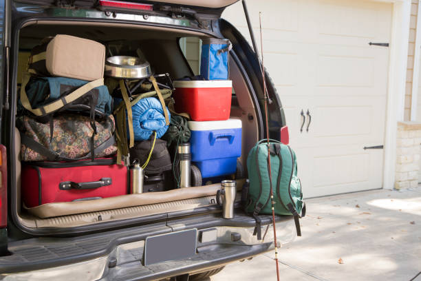 Packing vehicle for camping vacation trip. stock photo