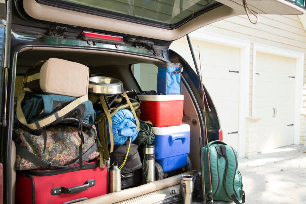 istock Packing vehicle for camping vacation trip. 1286889705