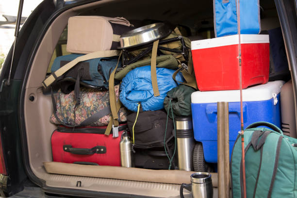 istock Packing vehicle for camping vacation trip. 1286889717