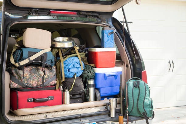 istock Packing vehicle for camping vacation trip. 1286889730