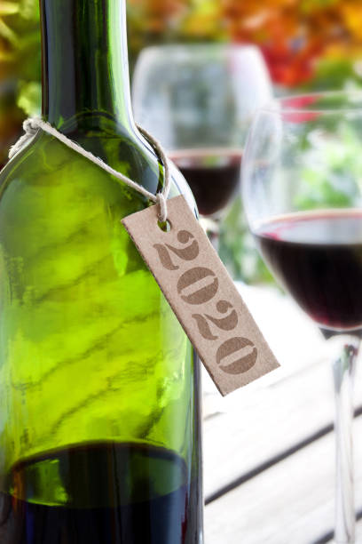 istock Red wine and bottle with label 2020 1286891451