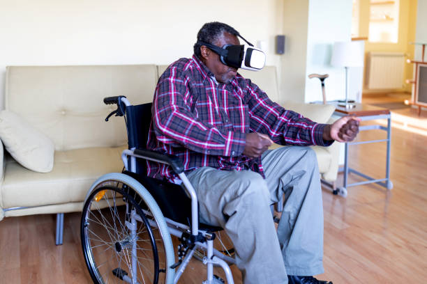 istock Senior Afro-American in Wheelchairs is Enjoying in Virtual Reality 1286892249