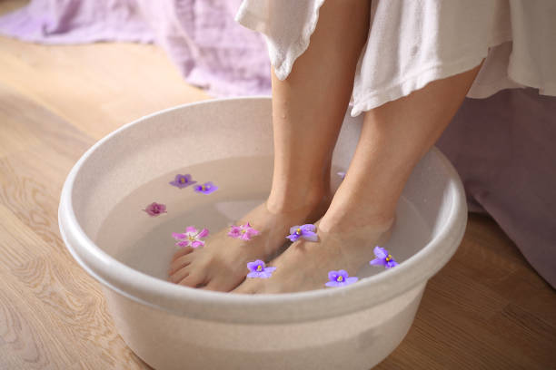 istock female feet in spa bowl 1286893926