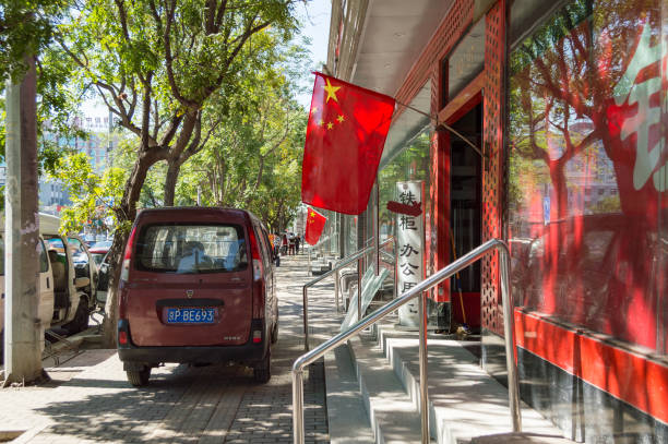 National flags of the People's Republic of China in the streets of Beijing Beijing / China - September 28, 2018: National flags of the People's Republic of China in the streets of Beijing, commemorating the national holiday, 1st of October, Founding Day of the PR of China. xi jinping stock pictures, royalty-free photos & images