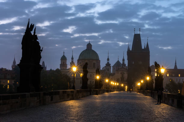 istock Charles Bridge stone bridge over the Vltava river at night 1286894926