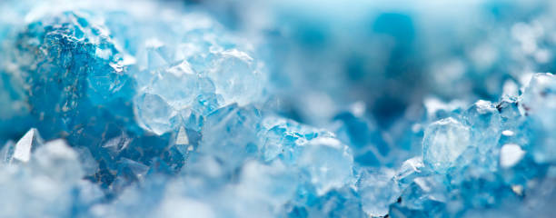 istock Blue Crystals. Macro. Winter Backgroun.Beautiful Light. Banner format. 1286896336