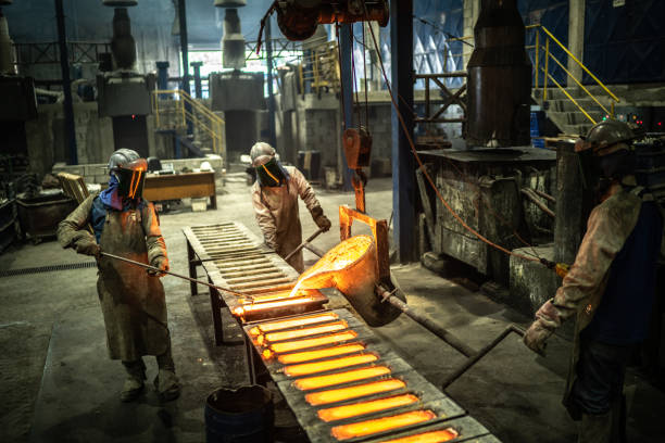 istock Metal industry work - pouring molten metal 1286896368
