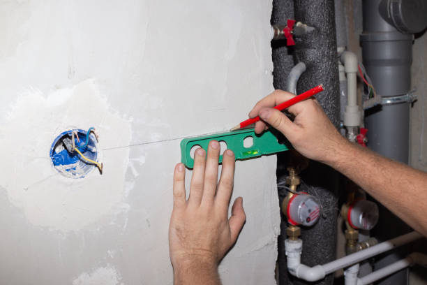 istock installation of additional electrical outlets in the bathroom wall. Construction and repair. 1286896505