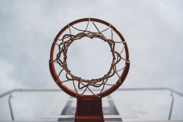 istock Basketball hoop with sky background 1286897424