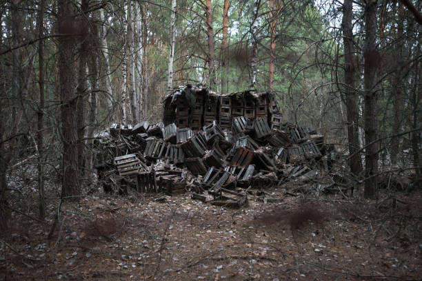 istock Dump of old boxes near ghost town Pripyat 1286904378