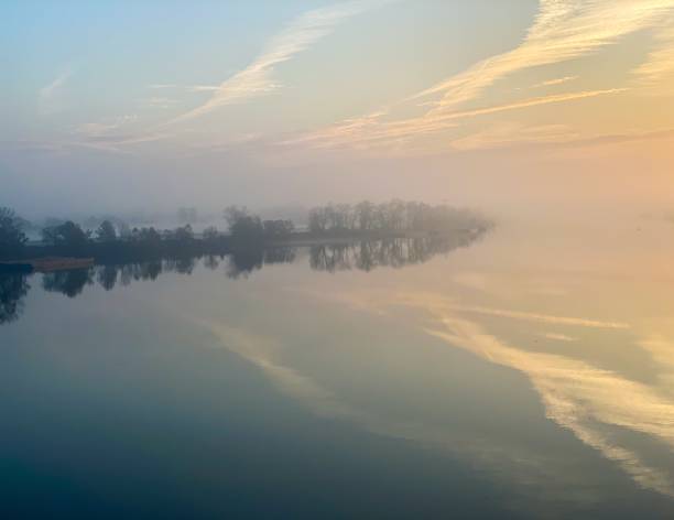 istock Foggy Autumn Sunrise Over the Arkansas River 1286904892
