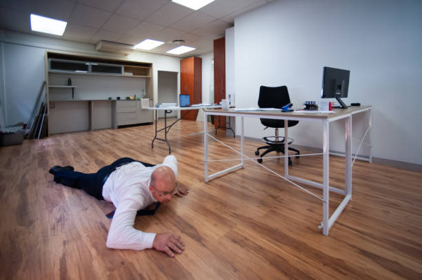 istock Office Goof tripping falling and spectaculary drops a digital tablet in an office 4of4 1286905930