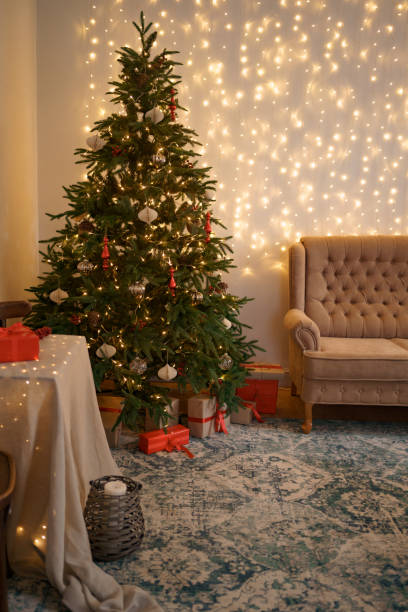 istock Christmas living room with a christmas tree and presents under it 1286906722