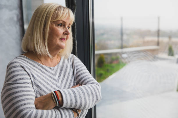 istock Senior Woman Deep in Thought 1286907842