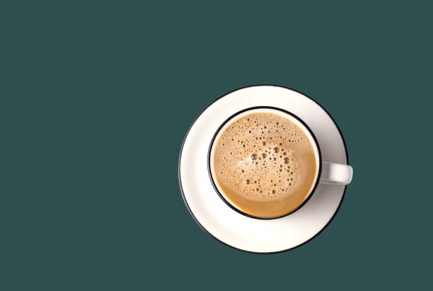 Coffee Latte Art in a cup on trendy color of 2021 tidewater green background. Coffee Latte Art in a cup on trendy color of 2021 tidewater green background, flat lay. food sample cups stock pictures, royalty-free photos & images