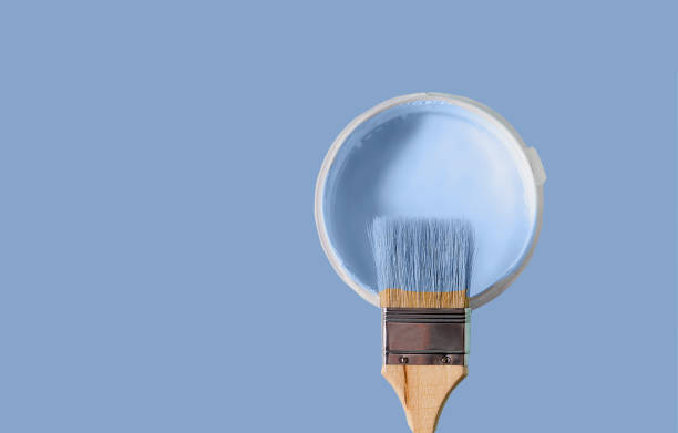 Can with paint of ceruleancolor on cerilean background. Copy space for your text.