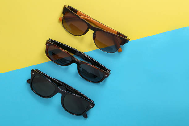 istock Fashionable sunglasses on minimal colorful background.Leave space for adding your content or text. 1286908979