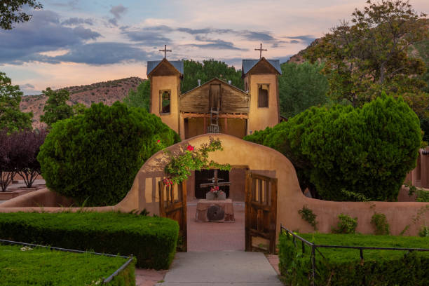 Historic El Santuario de Chimayo in Chimayo, New Mexico at sunset