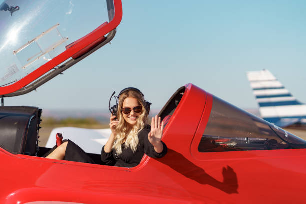 istock Young woman piloting a plane 1286912323