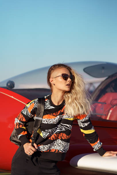 istock Model posing in sport outfit and sunglasses 1286912387